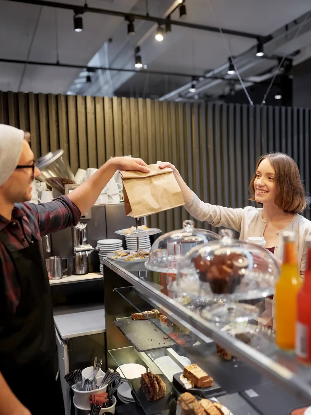 Customer receiving pre ordered food from waiter